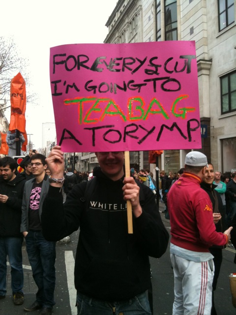 sign reads: for every cut I will teabag a Tory
