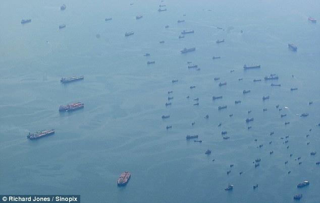 hundreds of empty ships lay in wait for the coast of Singapore